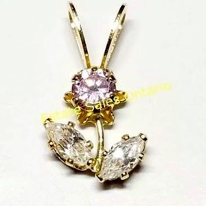 14K yellow gold cubic zirconia pendant of 0.3 grams
